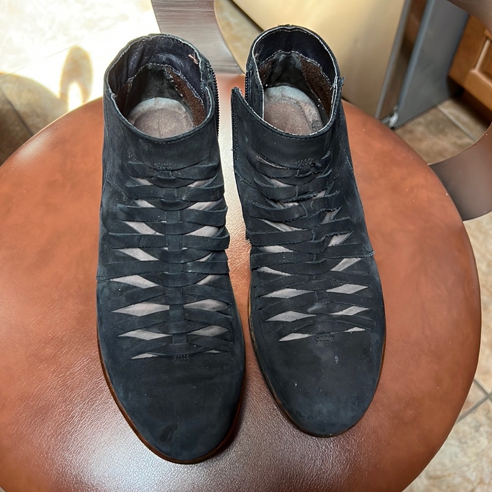 Black Naot boots. Slightly worn condition